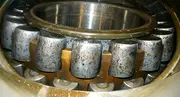 Contaminated roller bearing showing wear caused by poor oil cleanliness and lubrication