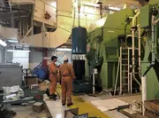 Offline filtration unit installed in a marine engine room connected to a large diesel engine lubrication system