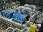 Industrial power plant machinery and piping used in turbine or control systems.