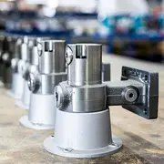 Close-up of precision-machined metal spare parts used in CJC oil filtration systems.