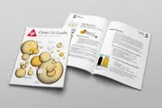 Cover and open pages of The Clean Oil Guide booklet showing educational content about oil contamination and filtration.