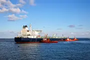 Oil tanker and support vessel at sea, representing thruster and stern tube systems where clean oil and effective oil filtration reduce water contamination and prevent corrosion and unplanned dry-docking.