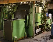 Industrial IPSEN chamber furnace and quenching system used in heat-treatment processes for metal components.