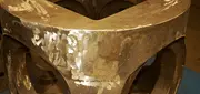 Molten metal being poured into a mould in a foundry, illustrating marine propulsion casting production for ship components.