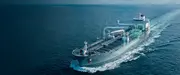 Aerial view of a container vessel at sea, illustrating how clean oil and advanced oil filtration support reliable marine and offshore operations under continuous load and harsh operating conditions.