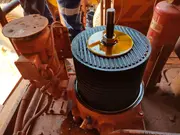 Offline oil filtration unit with stacked filter inserts installed on a mining haul truck hydraulic system.