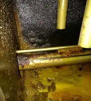 Diesel fuel system interior showing microbial contamination and sludge buildup caused by bacteria and water