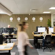 Employees working in a modern office at C.C.JENSEN, illustrating a professional workplace and daily collaboration.