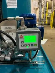 Oil particle counter displaying ISO cleanliness code 9/6/2 during oil condition monitoring.