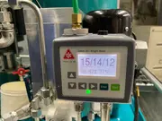 CJC® particle counter showing oil cleanliness measurement ISO 15/14/12 during hydraulic oil filtration monitoring.