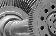 Close-up of large steam turbine gears illustrating lubrication systems and water removal in turbine lube oil.